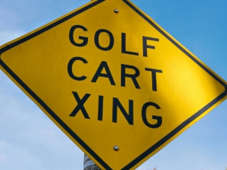 Golf cart crossing for Golf cart insuranace and LSV insurance near me from Think Safe Insurance