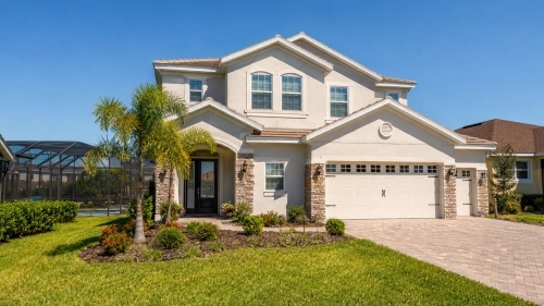 Modern two-story home with pool enclosure in Davenport FL subdivision