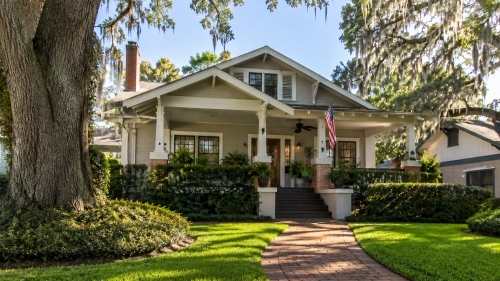 Historic home in Lakeland FL neighborhood near Downtown with mature oak trees