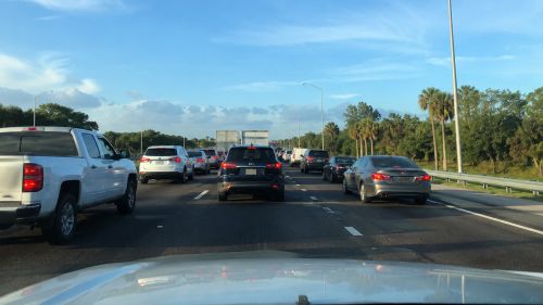 Heavy commuter traffic on a Central Florida highway near Auburndale FL during morning rush hour